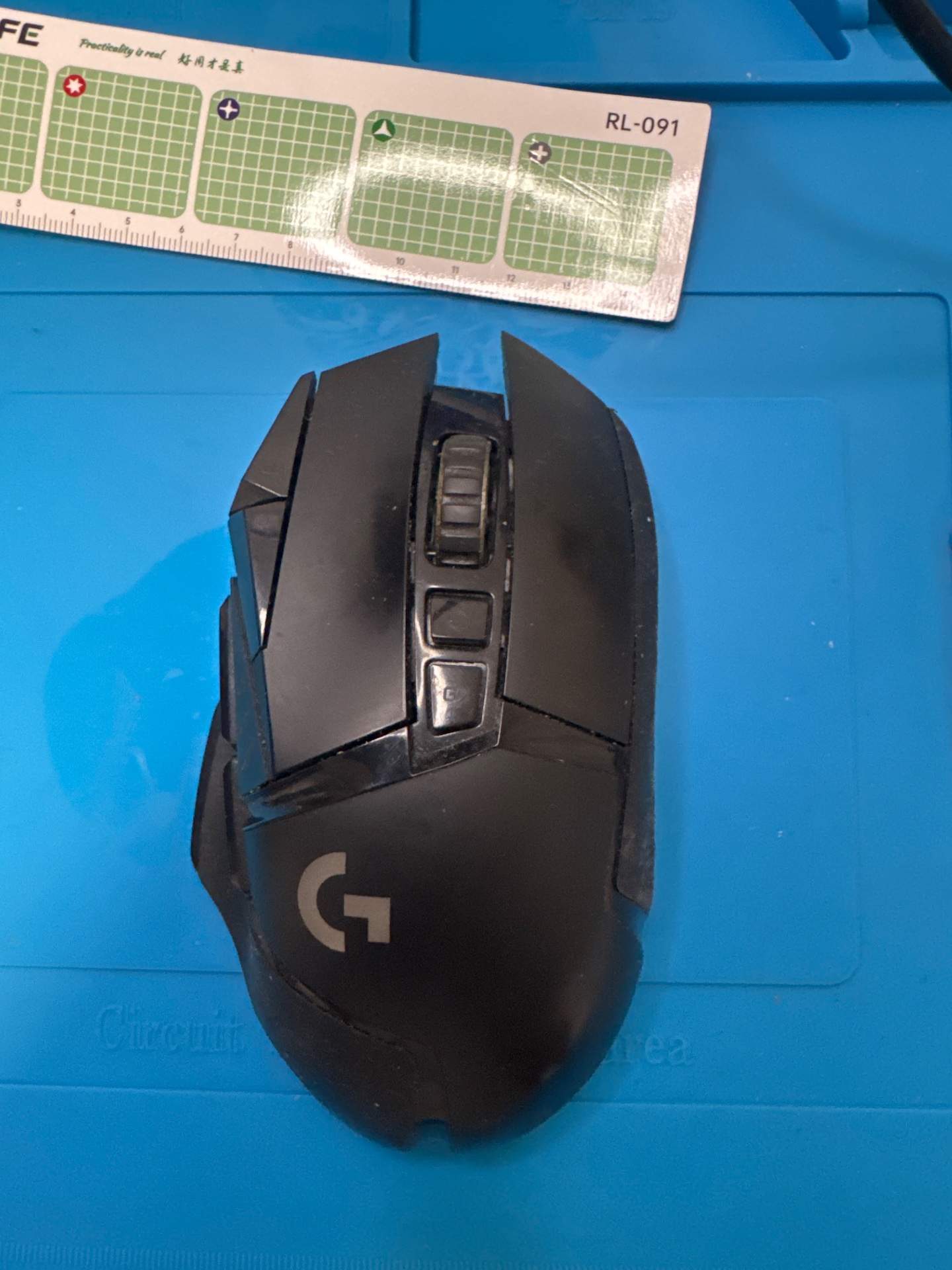 罗技G502 无线版本 电源接触不良，怀疑是开关损坏 实拍图