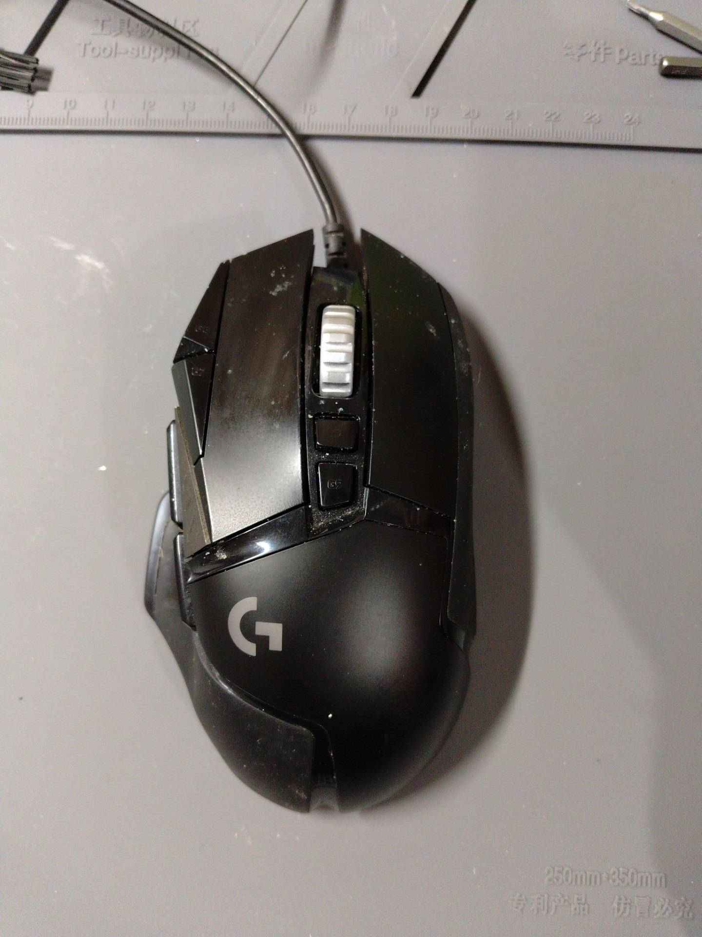 罗技 G502 侧键前进键损坏，右键损坏，要求更换防止盲狙的微动配置+脚贴 实拍图